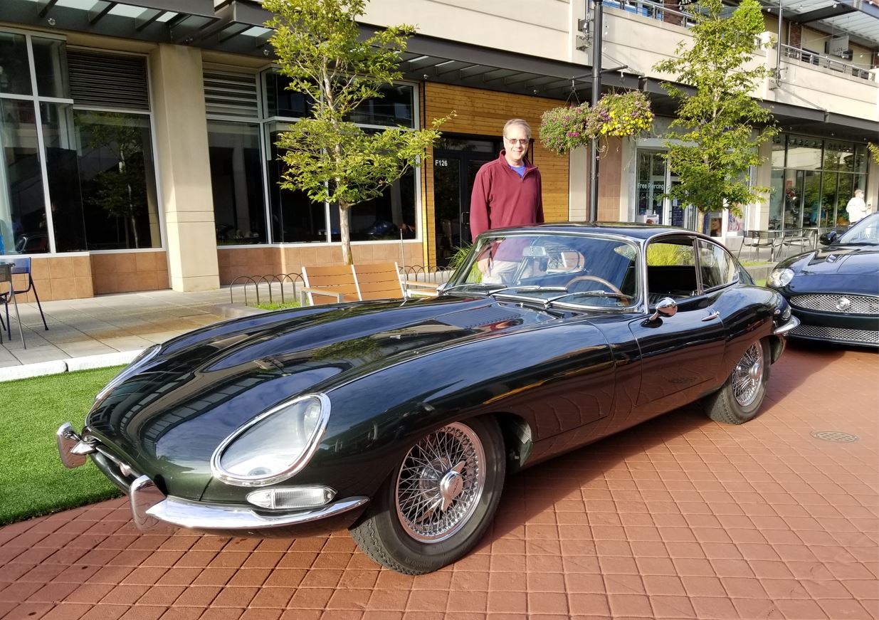 1966 green E-Type FHC belongs to member David Bosworth.   His son Doug, behind car, had driven it to the Exotics.