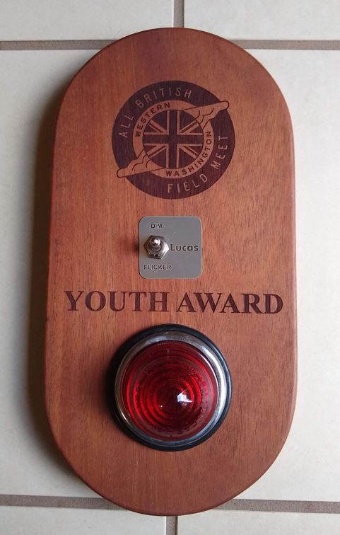 The WWABFM Youth Award.  The toggle actually could turn on the light.  This award was won by Glen and Debbie Read with their 1959 XK150S