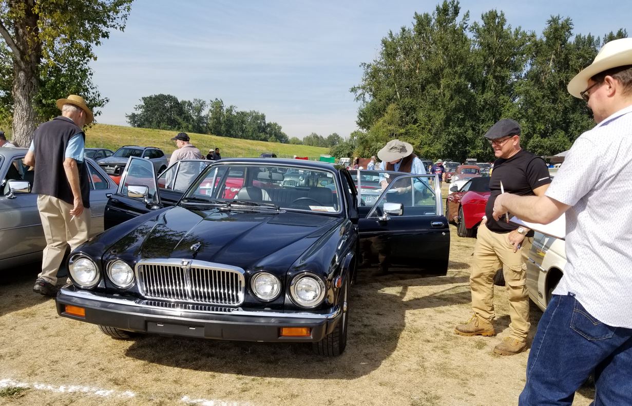 Judging David Adelman's 1974 XJ12L saloon.  He got first place in Driven Class in the Concours.