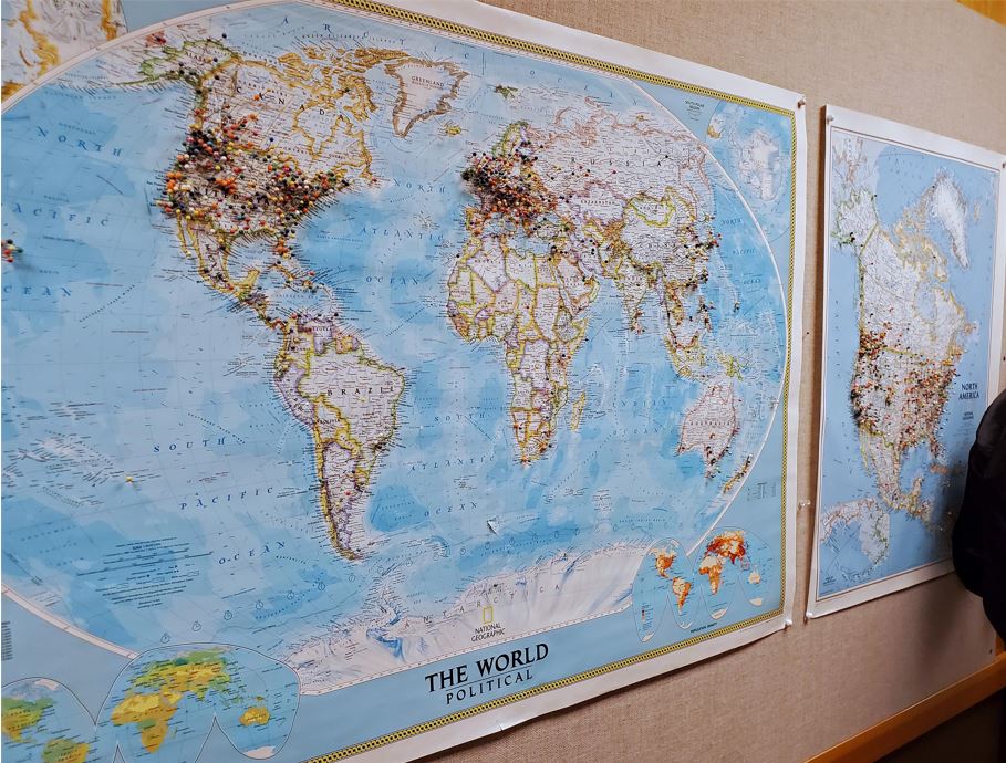 They had a world map with pushpins representing where visitors to their rally school have come from.