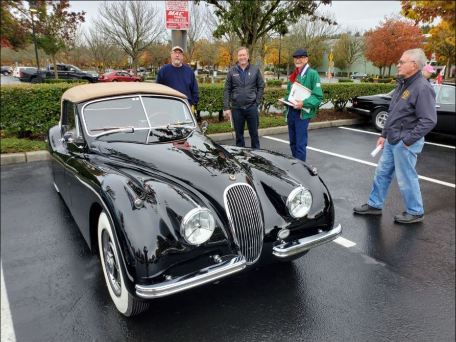 Mark Jones standing behind his 1953 XK120 DHC.  To his left are Craig Shrontz, Jim Sanders and Brian Case.