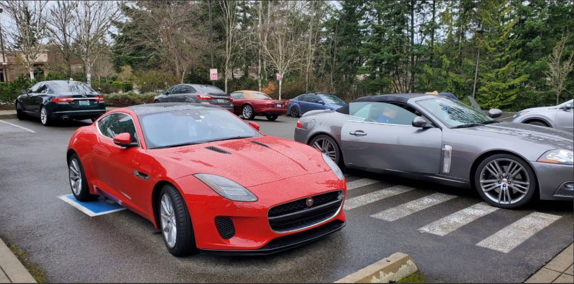 Red Jaguar in the parking lot belonged to Roy's friend Bill Hay.