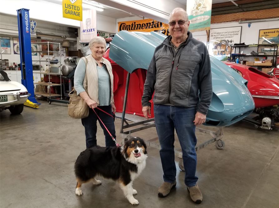 This is CJ and Leo Taflin (and the dog they are pet sitting) in front of their 1970 XKE Roadster's bonnet.
