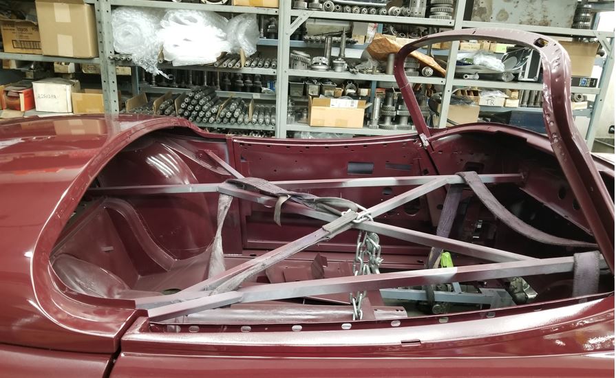 This photo shows more of the support jig.  The jig prevents the body panels from flexing prior to mounting on the chassis.