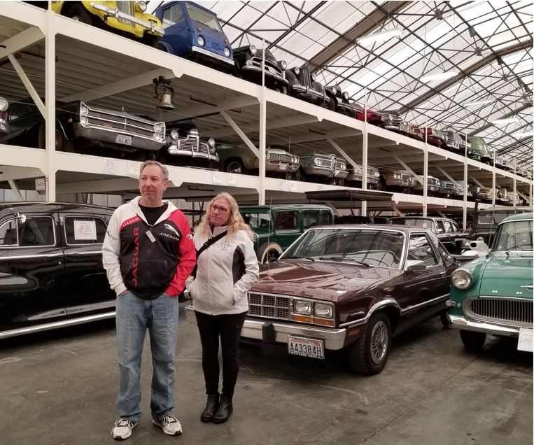 Vehicles were stacked three high in this warehouse!  Kurt Hrubant and Patty McKerney.