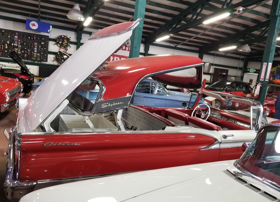 The top of this Ford Galaxie Skyliner folds back and down into the trunk of the car!